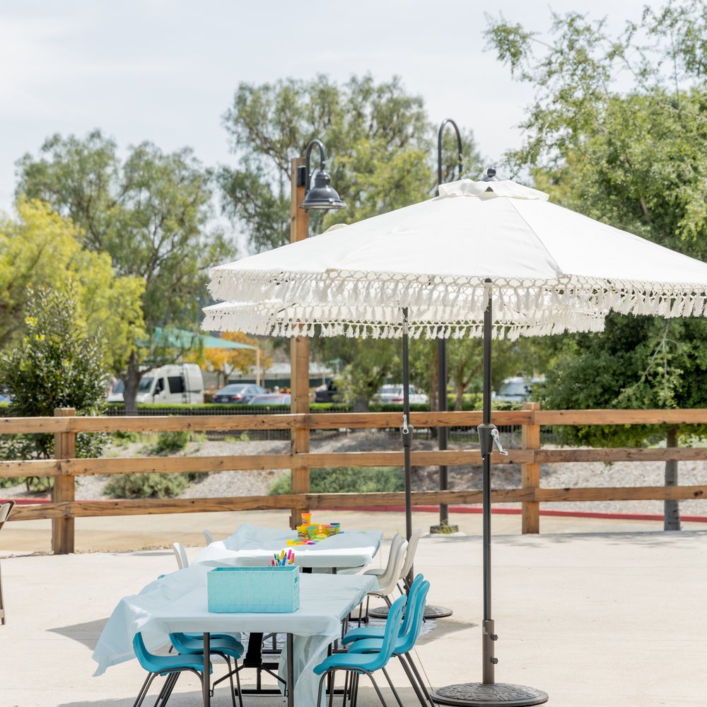 Rustic Events - The umbrellas were gorgeous and helped keep the kids in shade - Party Equipment Rentals Near Me