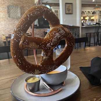 Prost Beer Hall - Classic salted pretzel with beer cheese - Cocktail Bars Near Me - Elk Grove, California Prost Beer Hall - Classic salted pretzel with beer cheese - Cocktail Bars Near Me - Elk Grove, California