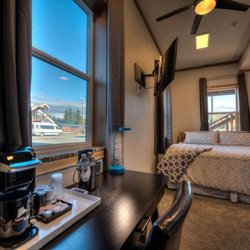 The Cannery Lodge - Henhouse Room - Attention to detail in every room! Old Cannery materials repurposed and celebrated throughout the campus. Luxury bedding.