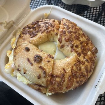 Cinnamon Roll Place - Cheese bagel with fluffy eggs and sausage. - Bakeries Near Me - Kihei, Hawaii