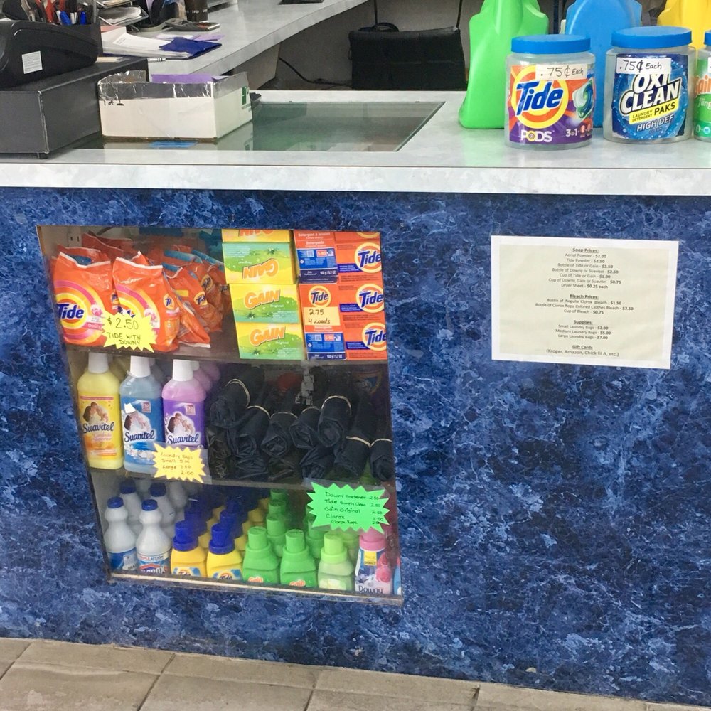 Counter where they sell laundry soaps, bounce sheets, and other supplies. Counter where they sell laundry soaps, bounce sheets, and other supplies.