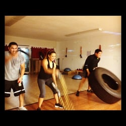 FitNow - Music Video Wednesday Boot Camp session. Battle ropes and tire toss circuit.