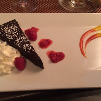 Bistro 72 - Flourless chocolate cake; Very rich! - American Near Me - Riverhead, New York Bistro 72 - Flourless chocolate cake; Very rich! - American Near Me - Riverhead, New York