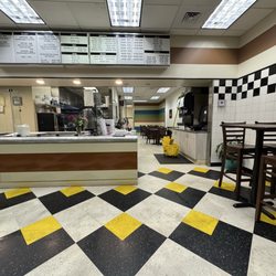 Pal Indian Cuisine - There's room to sit and eat, but I've only ever sat down to wait on my carry out order. I absolutely love the floor.