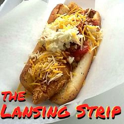 Galliformes - Chicken strip in a poppy seed bun topped with hot chili, cheese and coleslaw