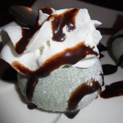 Fuji - Mochi ice cream (green tea flavor), close-up.