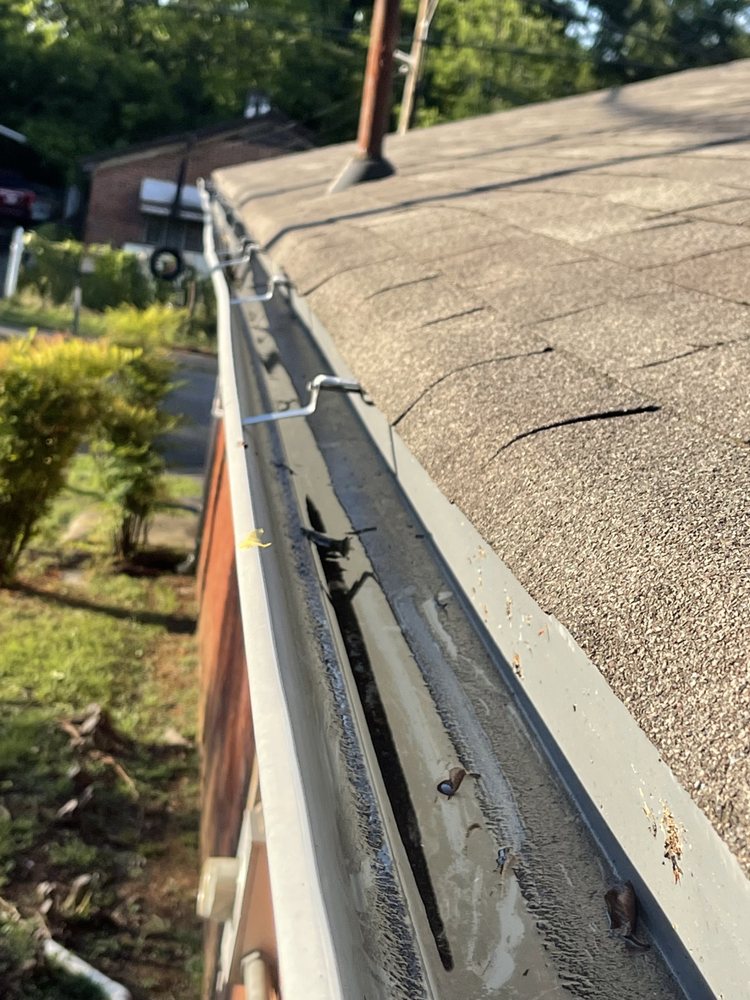 Slide of Marcus Gutters Cleaning