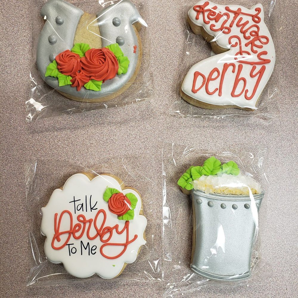 Cookies By Charity - four decorated cookies in plastic bags - Bakeries Near Me - Versailles, Kentucky