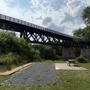 Rivers Bend RV Resort & Campground - Pretty bridge view since someone isn't assigned these spots - Campgrounds Near Me - Iron Mountain, Michigan Rivers Bend RV Resort & Campground - Pretty bridge view since someone isn't assigned these spots - Campgrounds Near Me - Iron Mountain, Michigan