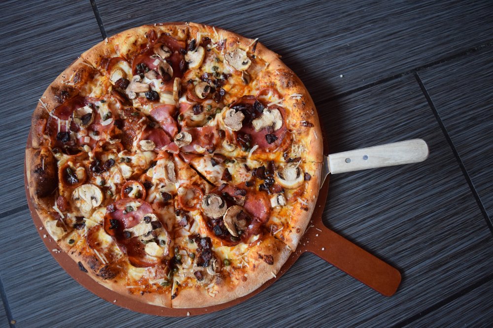 Order Tony’s Pick food online from Reginelli's Pizzeria store, New Orleans on bringmethat.com