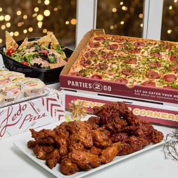 Ledo Pizza - a variety of food items on a table - Pizza Near Me - Olney, Maryland Ledo Pizza - a variety of food items on a table - Pizza Near Me - Olney, Maryland