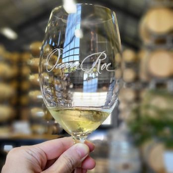 Owen Roe - a hand holding a glass of wine - Wineries Near Me - Wapato, Washington Owen Roe - a hand holding a glass of wine - Wineries Near Me - Wapato, Washington