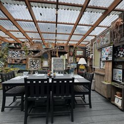 Wanda's Cafe + Bakery - Extended indoor patio area with amazing decoration and greenery.