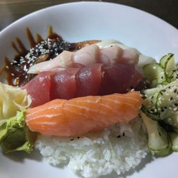 Chirashi with tuna, salmon, yellowtail, and eel. Crafted by the best sushi chef in North Alabama.