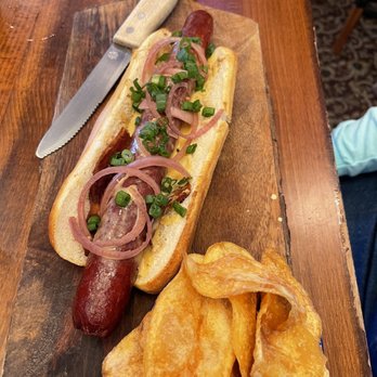 The Cellar Upstairs - 1/2 lb hotdog with beer cheese & bacon - Wine Bars Near Me - St. Augustine, Florida