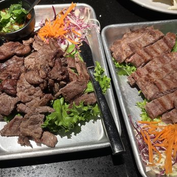 Moom 48 Thai - Thai BBQ Beef (left); Crying Tiger (right) - Asian Fusion Near Me - Pasadena, California Moom 48 Thai - Thai BBQ Beef (left); Crying Tiger (right) - Asian Fusion Near Me - Pasadena, California