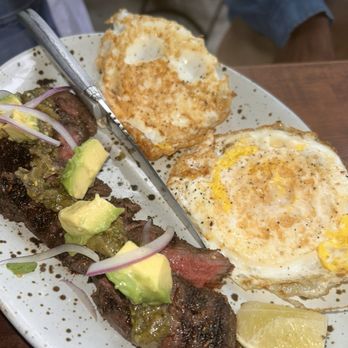 Manuela - Grilled Grass-Fed Skirt Steak, Charred Poblano & Tomatillo Vinaigrette, Avocado, Fried Eggs 6/10 - New American Near Me - Los Angeles, California Manuela - Grilled Grass-Fed Skirt Steak, Charred Poblano & Tomatillo Vinaigrette, Avocado, Fried Eggs 6/10 - New American Near Me - Los Angeles, California