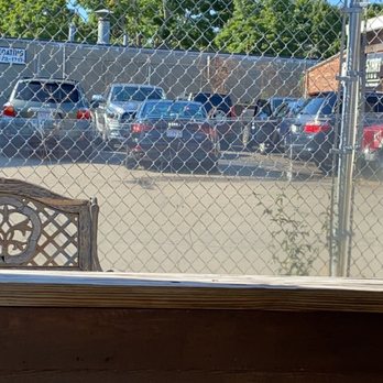 Fresh Start Detailing - Sitting in the outdoor rest area of the bar next door, watching my car being nicely treated! - Auto Detailing Near Me - Quincy, Massachusetts