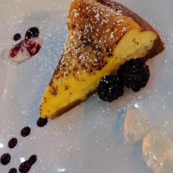 Novellas - Creme brûlée cheesecake with raspberry couli and Riesling jelly - American Near Me - New Paltz, New York Novellas - Creme brûlée cheesecake with raspberry couli and Riesling jelly - American Near Me - New Paltz, New York