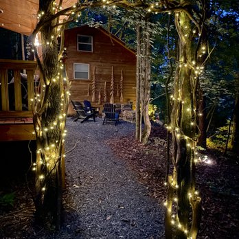 The Bear Affair Cabin - Illuminated archway beckons you to the flickering flames of the fire pit. 2024 - Vacation Rentals Near Me - Helen, Georgia The Bear Affair Cabin - Illuminated archway beckons you to the flickering flames of the fire pit. 2024 - Vacation Rentals Near Me - Helen, Georgia