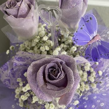 Royal Florist & Gifts - Purple Hong Kong flowers were stunning. We ended up using them as extra decoration on our cake table because they were so beautiful. - Florists Near Me - Walnut, California Royal Florist & Gifts - Purple Hong Kong flowers were stunning. We ended up using them as extra decoration on our cake table because they were so beautiful. - Florists Near Me - Walnut, California