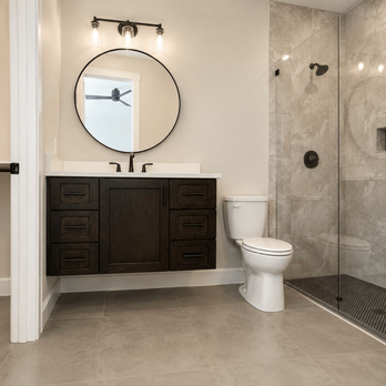 PHRS Remodeling - Complete bathroom remodel featuring a custom vanity, frameless glass shower, quartz countertop, and modern finishes. - General Contractors Near Me - San Antonio, Texas PHRS Remodeling - Complete bathroom remodel featuring a custom vanity, frameless glass shower, quartz countertop, and modern finishes. - General Contractors Near Me - San Antonio, Texas
