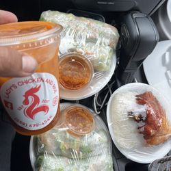 Lady's Chicken and Rice - 2 orders of spring rolls and chicken with rice, with a Thai tea to wash it all down.