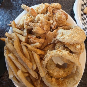 The Rusty Cowboy - Saturday Lunch Special. 12 shrimp, and 2 sides (we did fries and onion rings!) Huge portions!! - Steakhouses Near Me - Needville, Texas The Rusty Cowboy - Saturday Lunch Special. 12 shrimp, and 2 sides (we did fries and onion rings!) Huge portions!! - Steakhouses Near Me - Needville, Texas