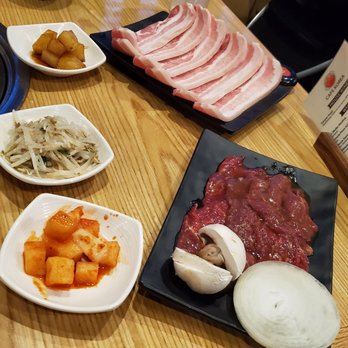 Cafe Korea - Pork belly (sam gyup sal) and boneless galbi; banchan dishes are radish kimchi, bean sprouts, potato - Korean Near Me - Fishers, Indiana Cafe Korea - Pork belly (sam gyup sal) and boneless galbi; banchan dishes are radish kimchi, bean sprouts, potato - Korean Near Me - Fishers, Indiana