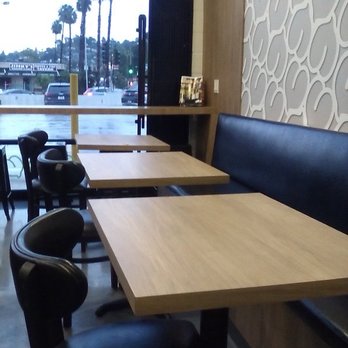 Amir's Falafel Los Angeles - inside of the restaurant.3 chairs were 3 feet away from the tables. I wanted the restaurant to look nice before taking this photo. - Middle Eastern Near Me - Los Angeles, California