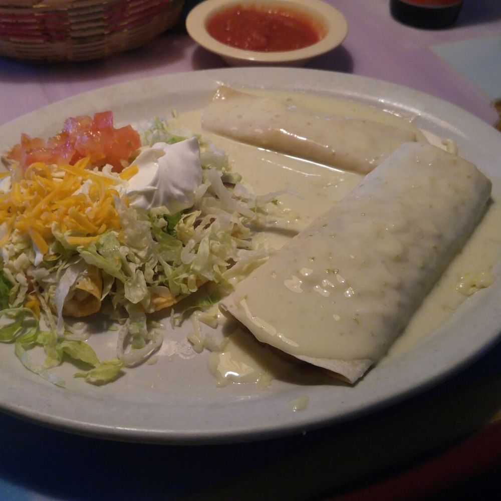 El Alamo - Vegetarian combo C: cheese enchilada, bean burrito, bean tostada, with nacho cheese. - Mexican Near Me - Delhi, Louisiana El Alamo - Vegetarian combo C: cheese enchilada, bean burrito, bean tostada, with nacho cheese. - Mexican Near Me - Delhi, Louisiana
