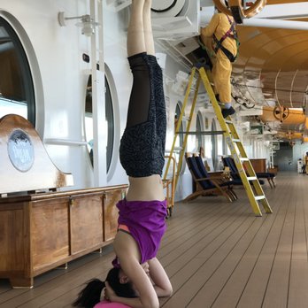TAG Yoga - Instructor practicing during a cruise - Yoga Near Me - Diamond Bar , California TAG Yoga - Instructor practicing during a cruise - Yoga Near Me - Diamond Bar , California