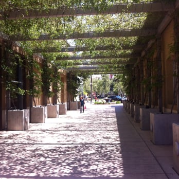 River Park Shopping Center - Gorgeous walkway with vines above overlooking the fountain - Shopping Centers Near Me - Fresno, California River Park Shopping Center - Gorgeous walkway with vines above overlooking the fountain - Shopping Centers Near Me - Fresno, California