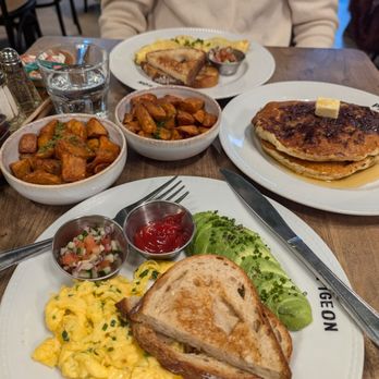 Pigeon - 2 eggs any style, an omlette, chocolate chip pancakes - Coffee & Tea Near Me - Toronto, Ontario