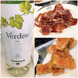 Perfect way to begin: white wine, jamón (ham), and tomato bread. Perfect way to begin: white wine, jamón (ham), and tomato bread.