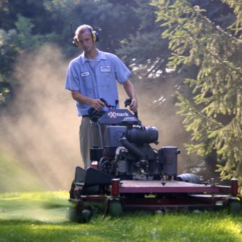 Devisser Landscape Service - a man mowing the grass - Landscaping Near Me - Kalamazoo, Michigan Devisser Landscape Service - a man mowing the grass - Landscaping Near Me - Kalamazoo, Michigan