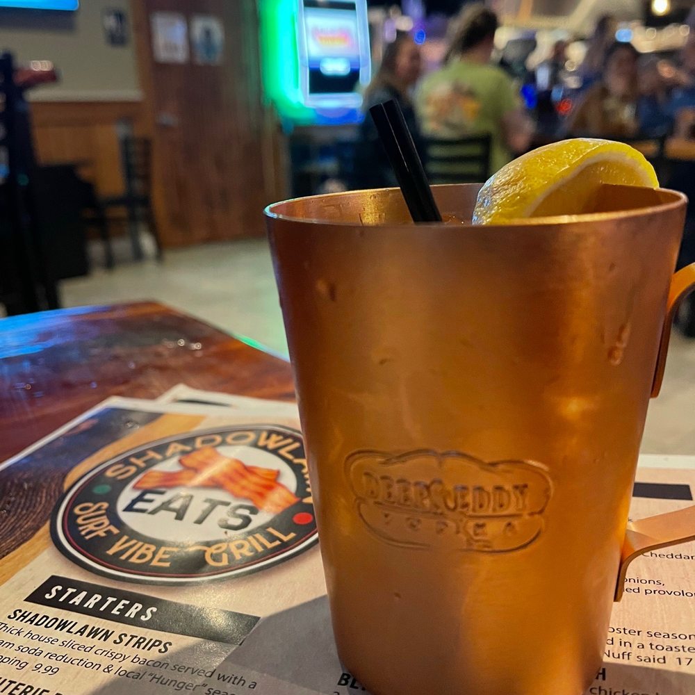 Shadowlawn Eats - a copper mug with a lemon wedge in it - New American Near Me - Virginia Beach, Virginia Shadowlawn Eats - a copper mug with a lemon wedge in it - New American Near Me - Virginia Beach, Virginia