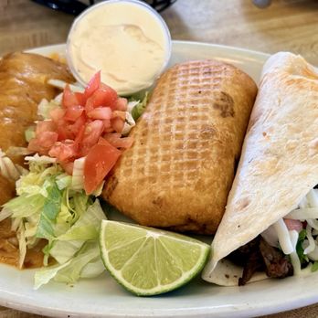 Little Cancun - Franklin - Chicken Enchilada, Chicken Chimichanga, Steak Taco with cilantro, onion, tomato, cheese - Mexican Near Me - Franklin, Wisconsin Little Cancun - Franklin - Chicken Enchilada, Chicken Chimichanga, Steak Taco with cilantro, onion, tomato, cheese - Mexican Near Me - Franklin, Wisconsin