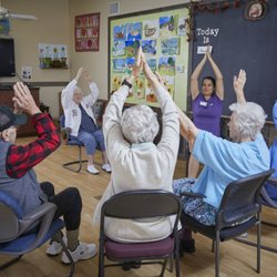 ElderHealth & Living Memory Village - Chair yoga activity.  Keeping people moving!