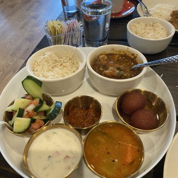 Roaring Indian Plates & Pours - Meat Thali with chicken chettinad. Takes me back to Kerala flavors. - Indian Near Me - Maple Valley, Washington Roaring Indian Plates & Pours - Meat Thali with chicken chettinad. Takes me back to Kerala flavors. - Indian Near Me - Maple Valley, Washington