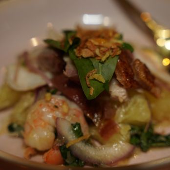 Hang - a bowl of food with a spoon in it - Bars Near Me - Montreal, Quebec