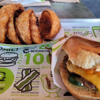 BurgerFi - cheeseburger with grilled onions, fiSauce and jalapenos - Burgers Near Me - Nottingham, Maryland