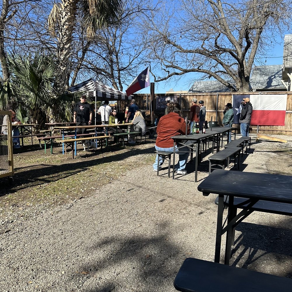 Texas Made Supply Company - a group of people sitting at picnic tables - Burgers Near Me - Georgetown, Texas Texas Made Supply Company - a group of people sitting at picnic tables - Burgers Near Me - Georgetown, Texas