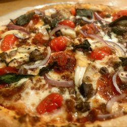 Blaze Pizza - Pepperoni, bacon, mushrooms, red onion, cherry tomatoes, roasted garlic, Fresh basil, oregano, and a pinch of sea salt.