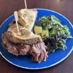 The Copper Crust - Pastrami on rustic bread with green salad