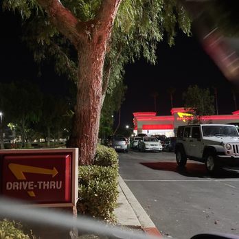 In-N-Out Burger - Entrance of drive thru. Long lines for inside and drive thru - Burgers Near Me - Chino, California