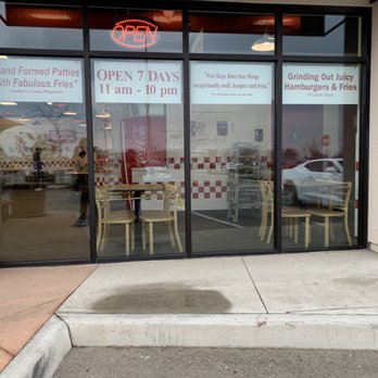 Five Guys - the entrance to a fast food restaurant - Burgers Near Me - Fresno, California