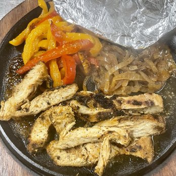 Wolf Track Inn Bar & Grill - chicken, peppers, and onions in a skillet - Bars Near Me - Charleston, South Carolina Wolf Track Inn Bar & Grill - chicken, peppers, and onions in a skillet - Bars Near Me - Charleston, South Carolina