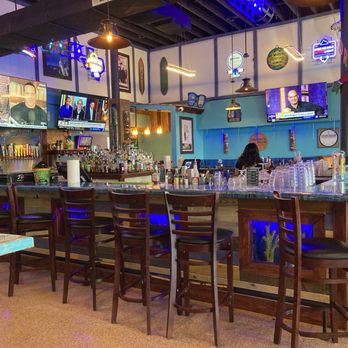 The Salty Dolphin - This bar seating looks like fun! 5 large TV's to view. - Golf Cart Rentals Near Me - Rockport, Texas The Salty Dolphin - This bar seating looks like fun! 5 large TV's to view. - Golf Cart Rentals Near Me - Rockport, Texas