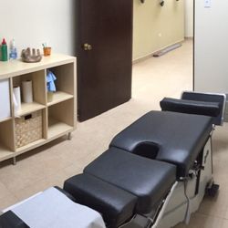 Natural Health Chiropractic - Treatment room, looking into functional rehab area.